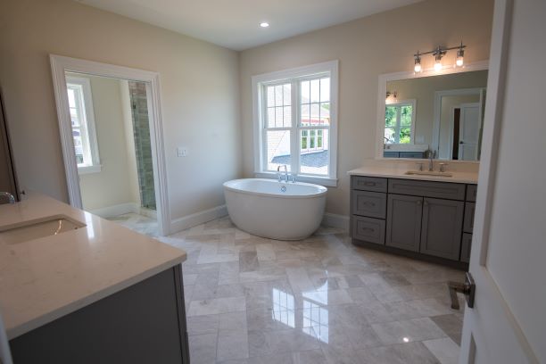 Bathrooms inside the home feature high-end features and upscale tile work. 