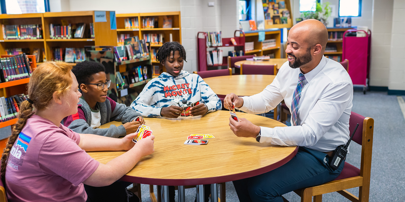Whitman Assistant Principal Matthew Johnson joins in a game of UNO with students.