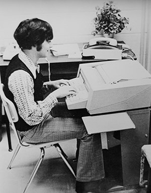 70's kid at selectric typwriter