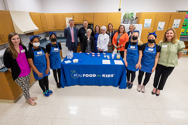 Franklin Middle School team members, and teachers Siri Jeffry and Jessica Spencer, showcased the entree and served samples to FCPS officials and School Board Chairwoman Stella Pekarsky.