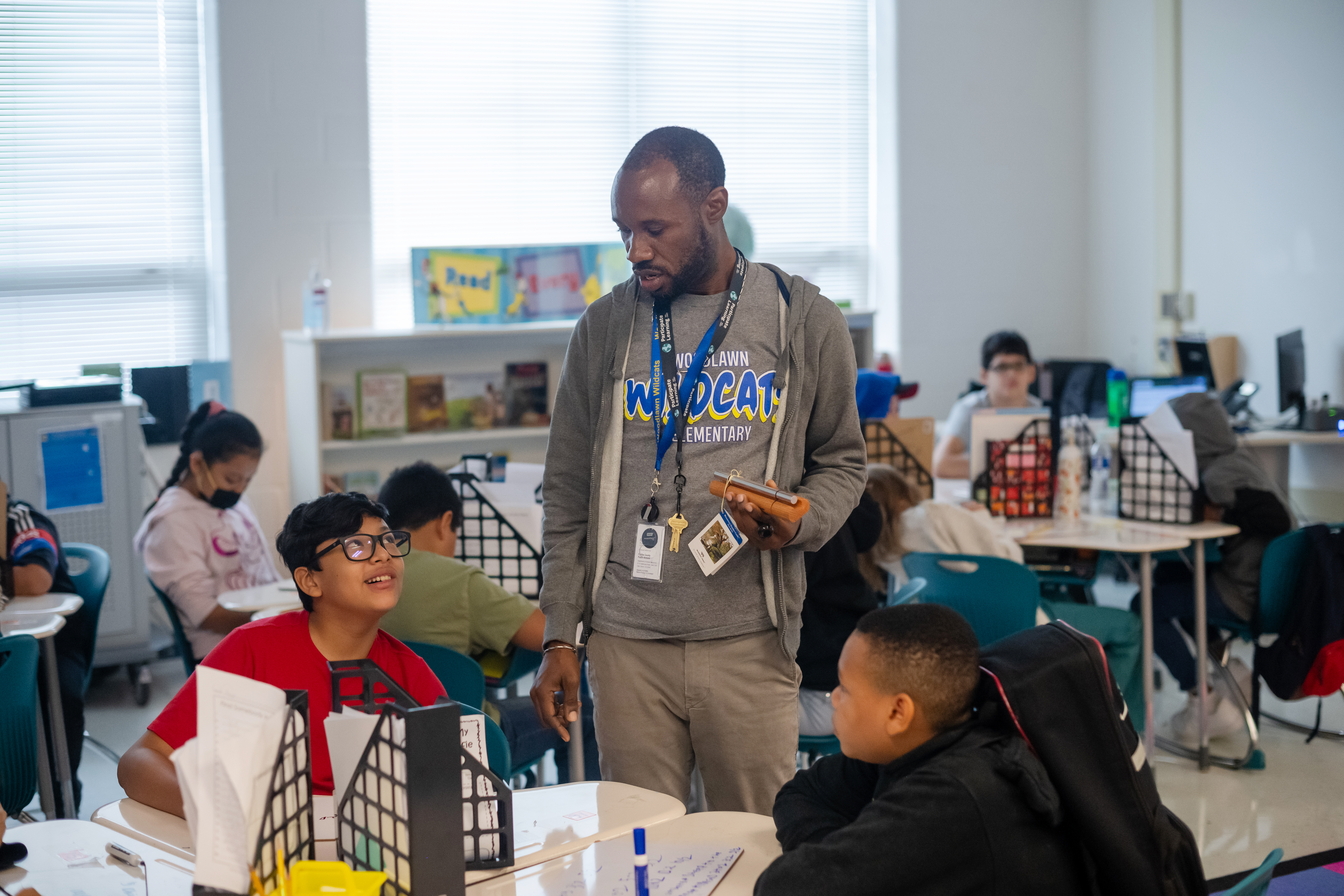 Christopher Jones, a Global Ambassador teacher at Woodlawn Elementary School who has 16 years of teaching experience, engages with students in the classroom.