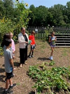 Dr. Reid visits the garden at Willow Springs ES