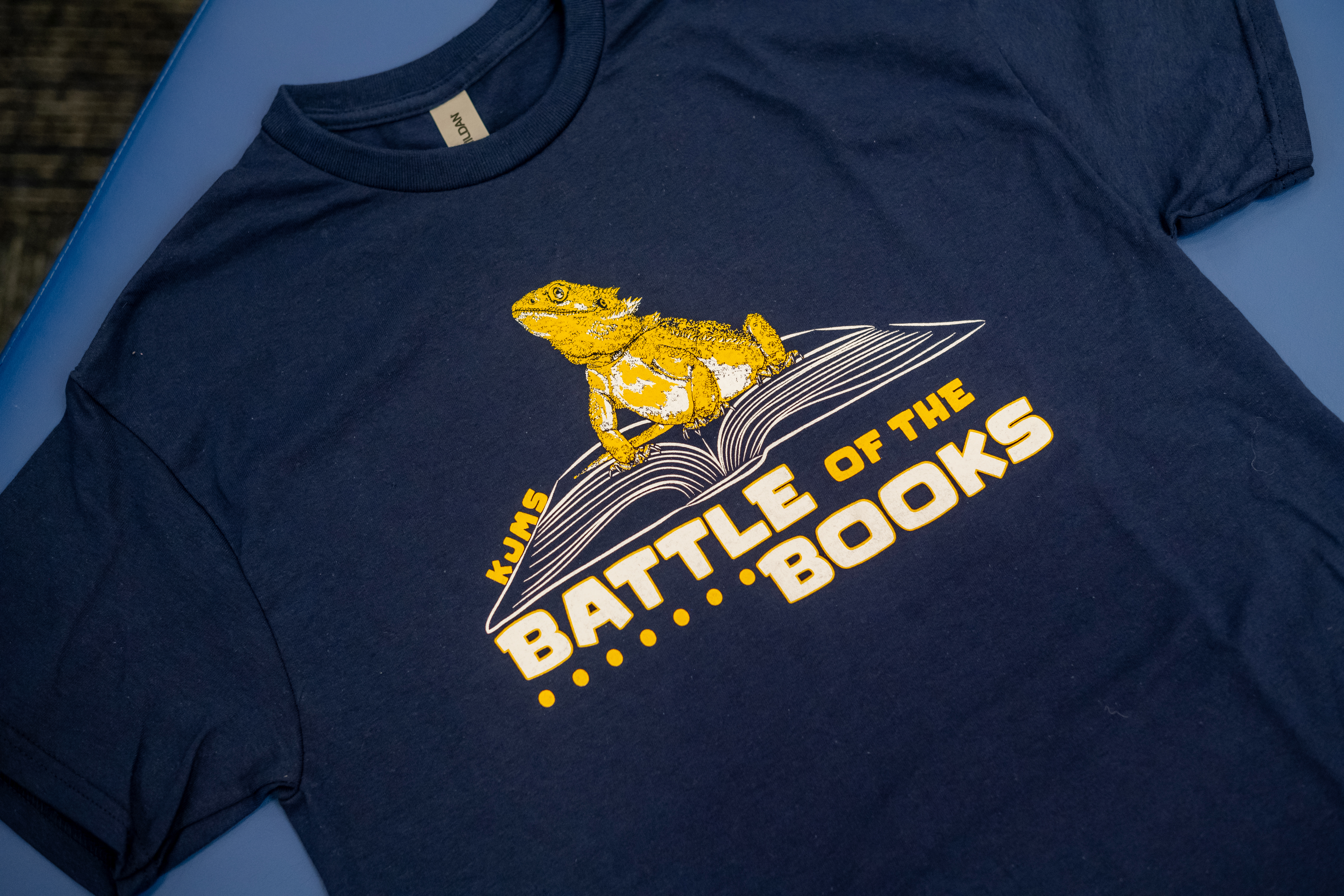 KJMS Battle of the books t shirt featuring a bearded dragon