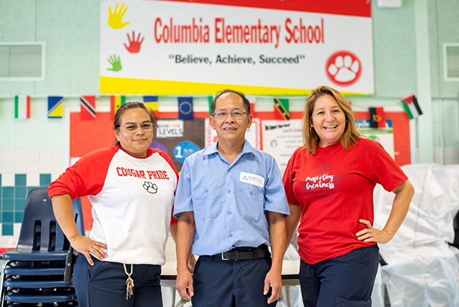 Three custodians at Columbia Elementary School