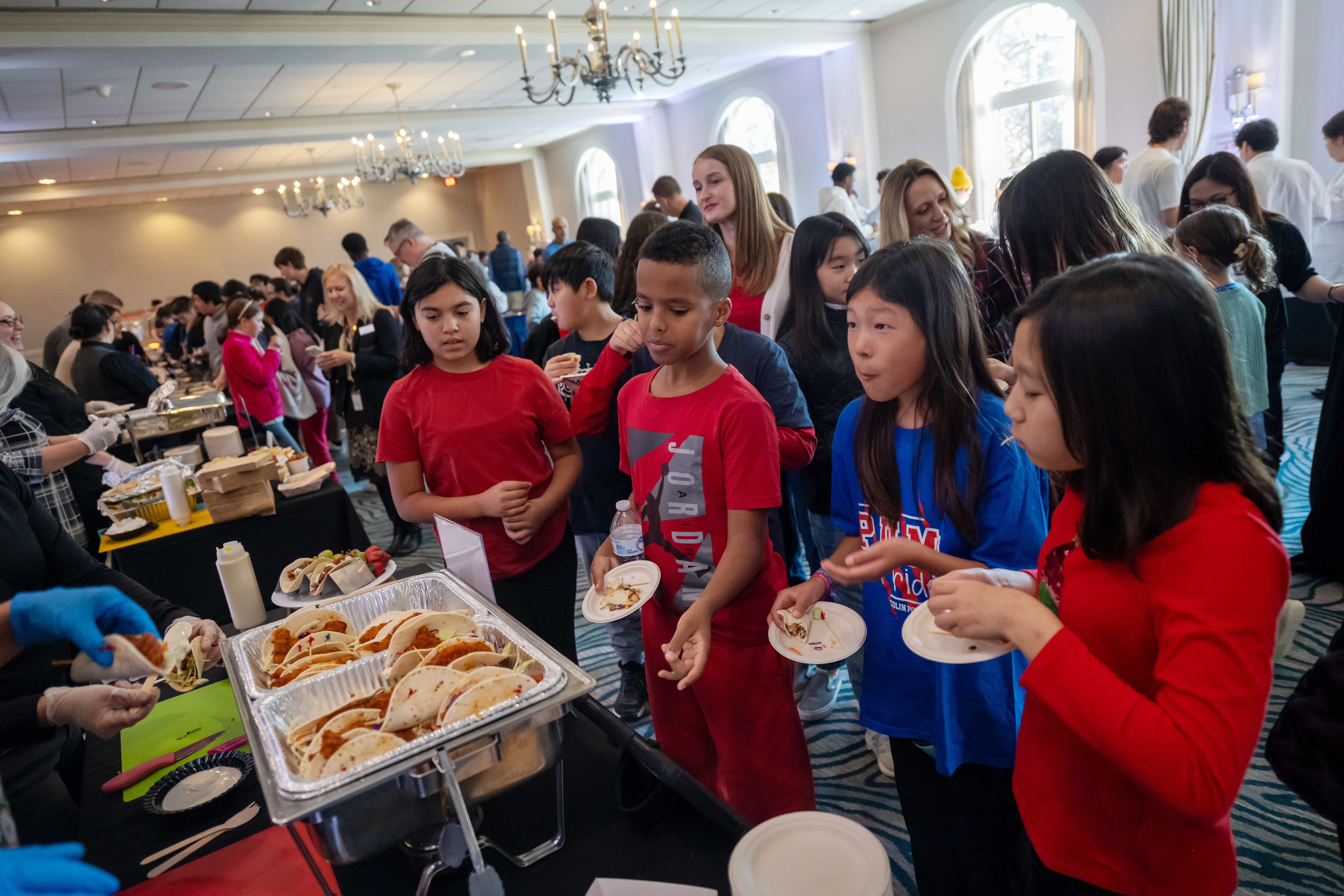 Students sampled a variety of recipes, including Nashville-style hot chicken tacos.