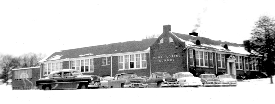 Photograph of the front exterior of Dunn Loring Elementary School taken in 1958.