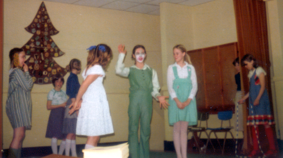 A photograph of students performing a skit.