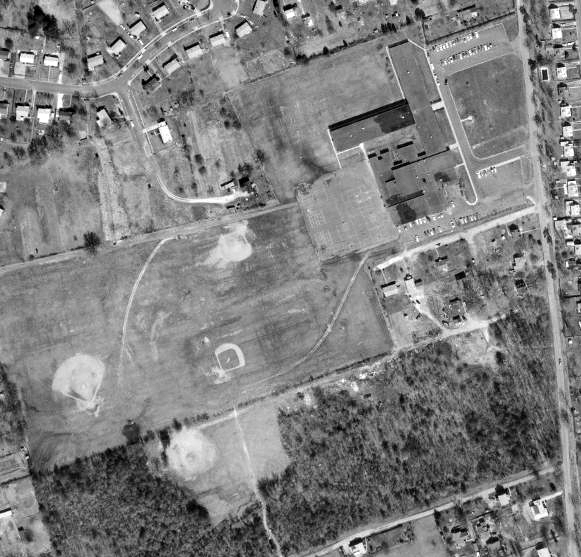 Aerial photograph of the Bryant Intermediate School site prior to its conversion to Groveton High School.