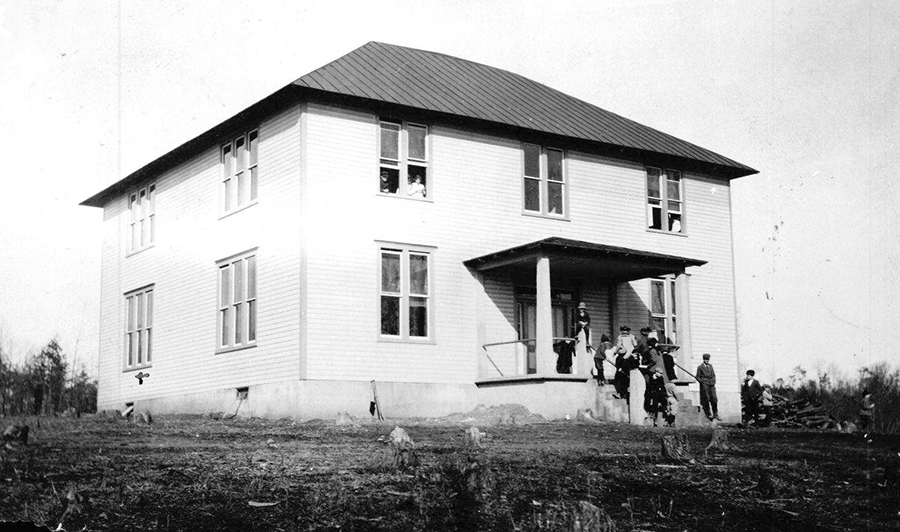 Black and white photograph of the two-story Clifton High School.
