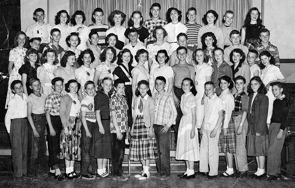 Undated class portrait. The students are posed in the auditorium.