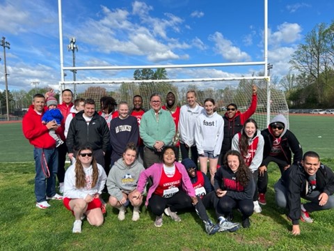 Dr. Reid with members of the Annandale HS Atoms Special Olympics team