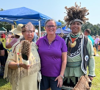 Primary chief of the Nottoway Indian Tribe of Virginia Lynette Allston, FCPS Superintendent Dr. Michelle Reid and 30-year FCPS employee Rick Kelly at the Nottoway Indian Tribe of Virginia's annual powwow.