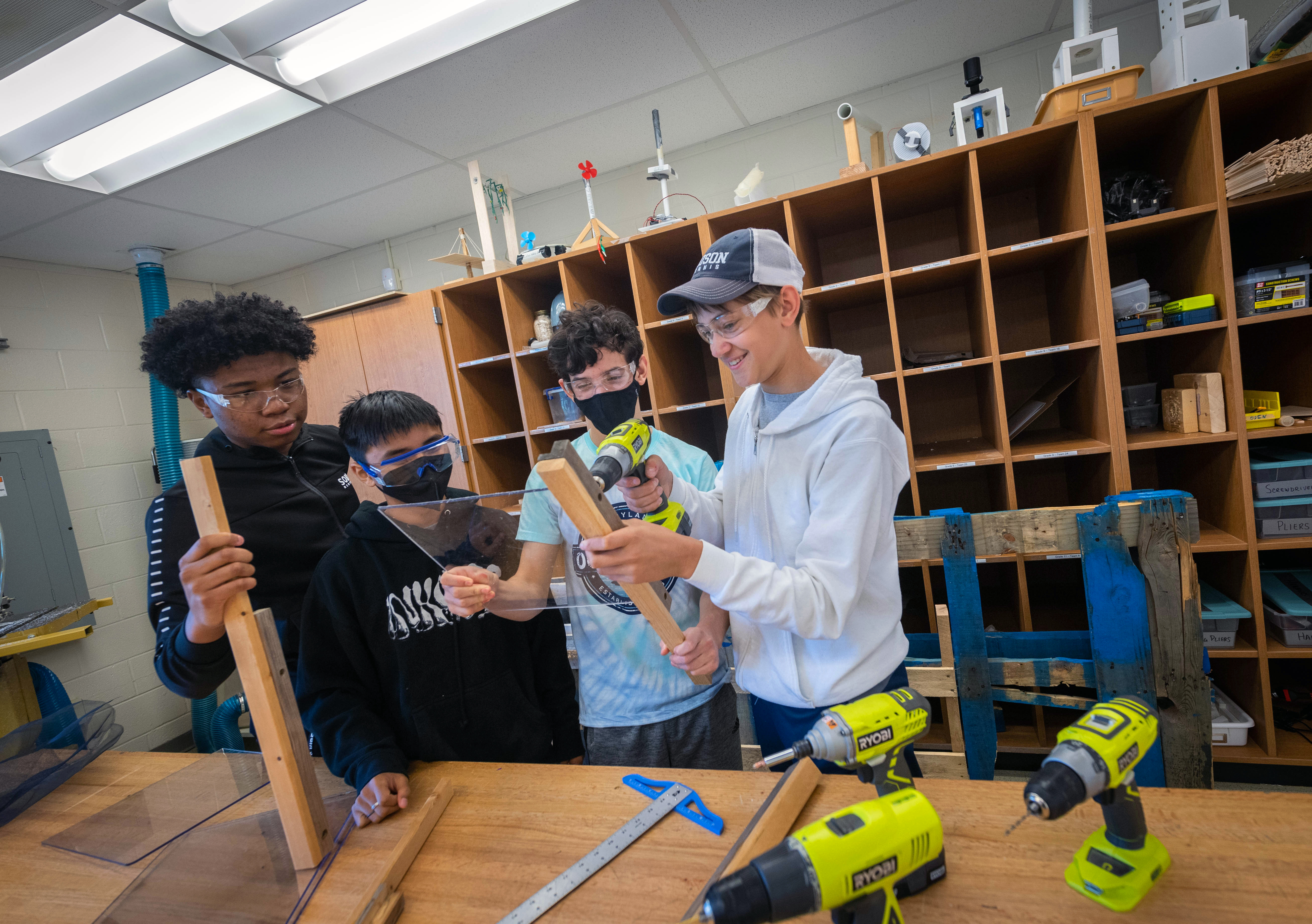 Another group of freshman students work to construct a container where mealworms  will live off styrofoam and plastic, then create waste products that can be used as fertilizer.