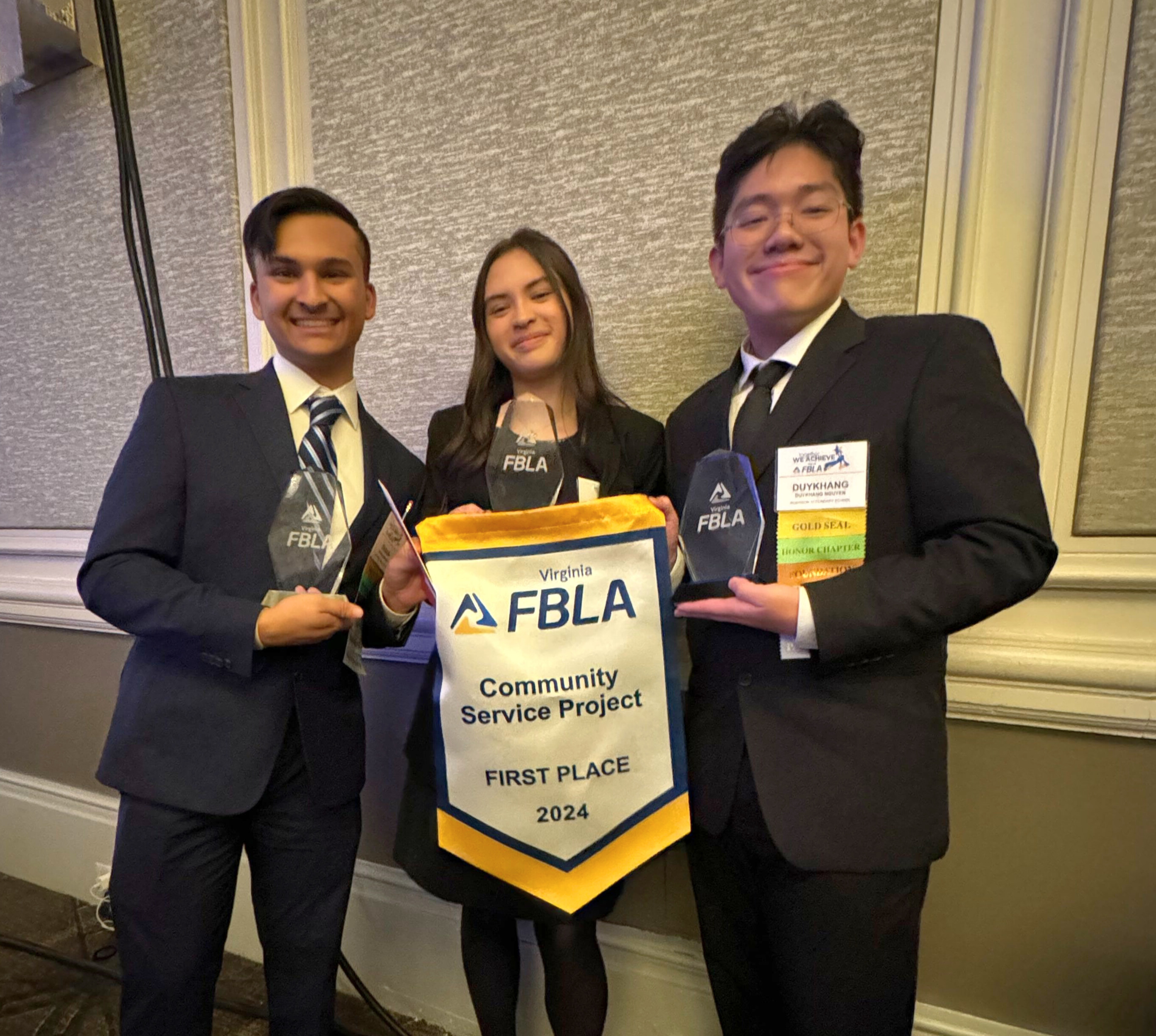 Robinson SS students and FBLA winners Shaan, Carmela, and DK (Duykhang)