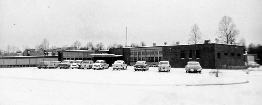 Black and white photograph of the front exterior of Masonville Elementary School.