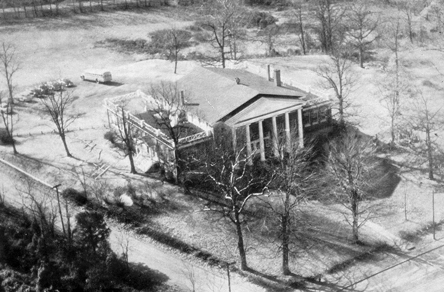 Picture postcard showing an oblique aerial view of Fairfax Elementary School.