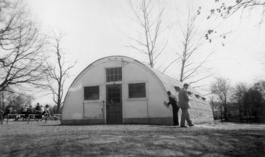 Black and white photograph of the Quonset hut that once stood behind Fairfax Elementary School.
