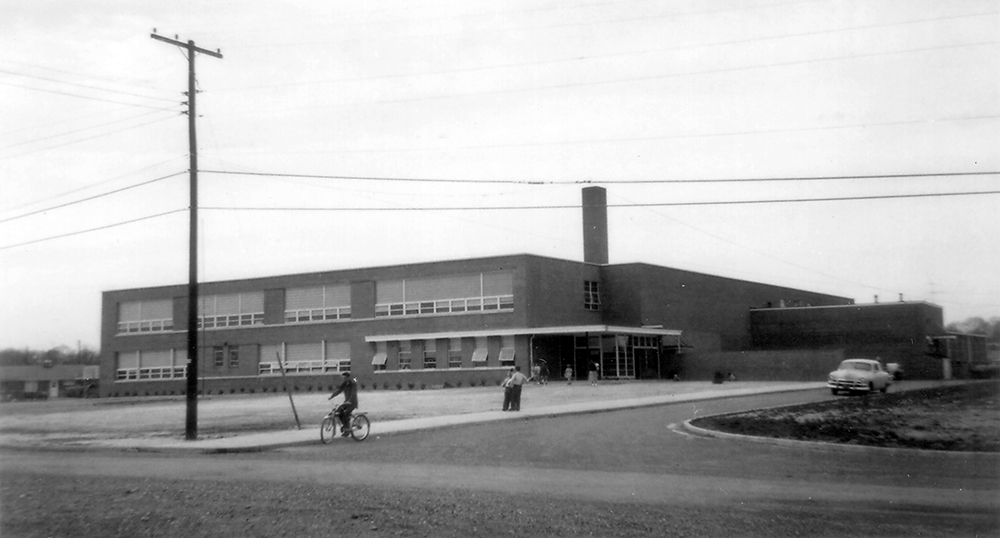 Black and white photograph of the front exterior of Hollin Hall Elementary School