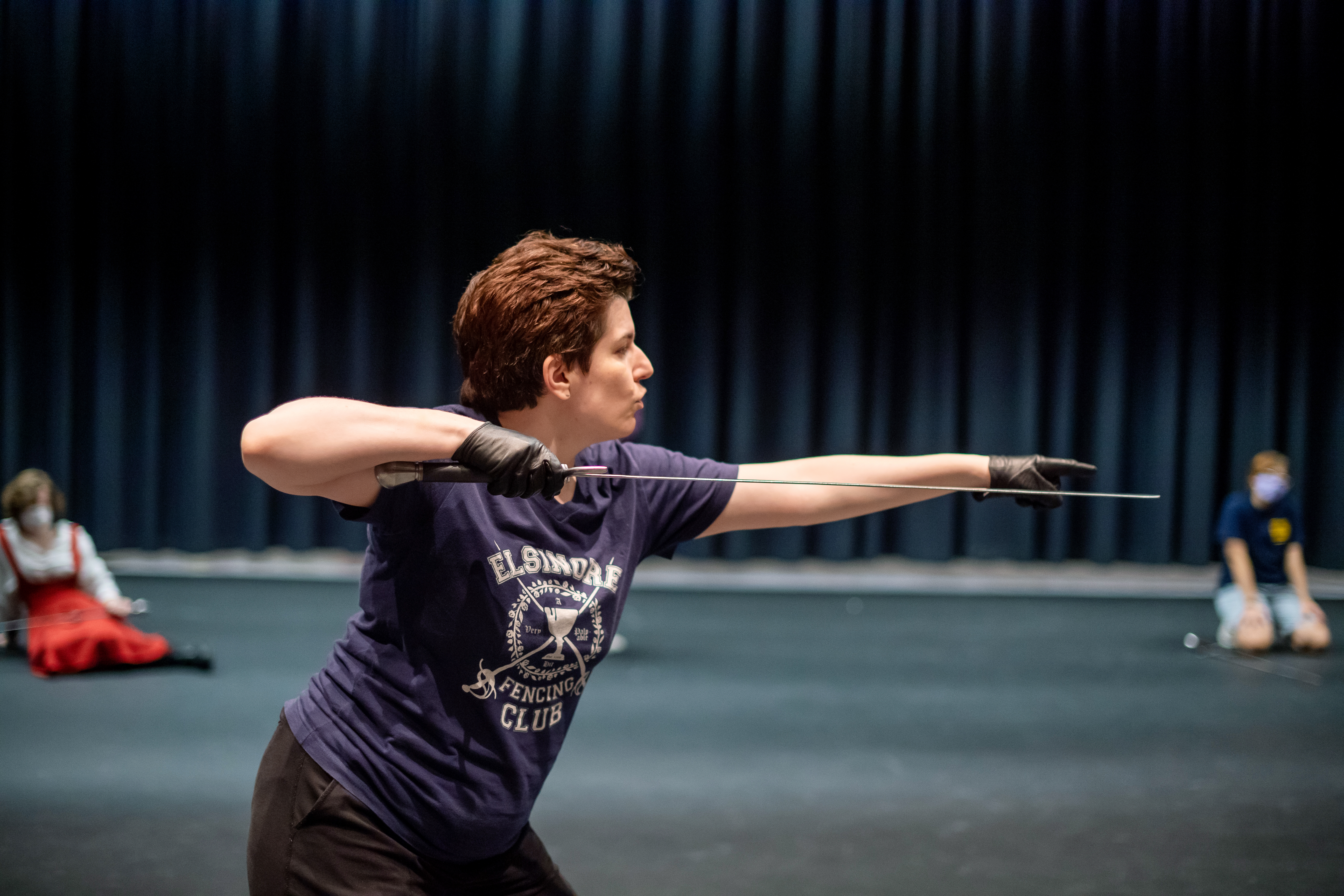 A stage combat instructor demonstrates a swordfight routine to Institute For The Arts students to learn.