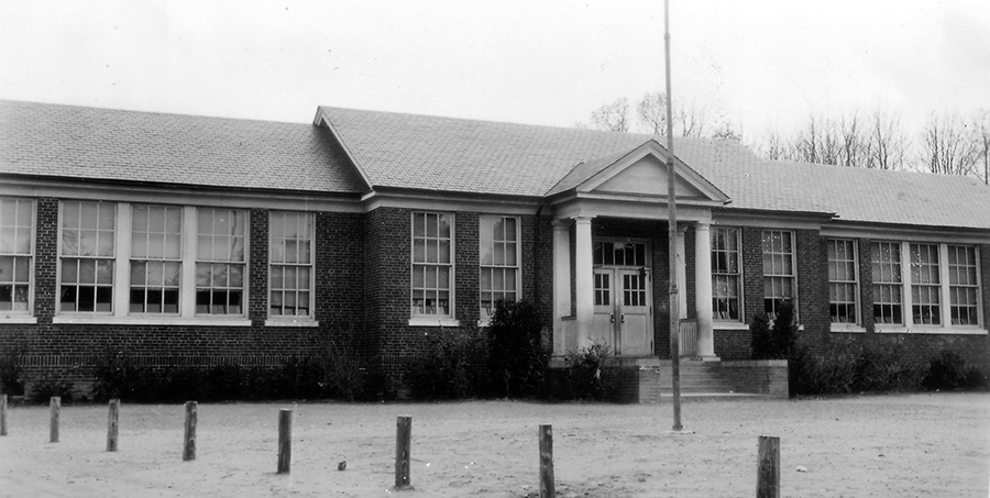 Black and white photograph of the front exterior of Lorton Elementary School.