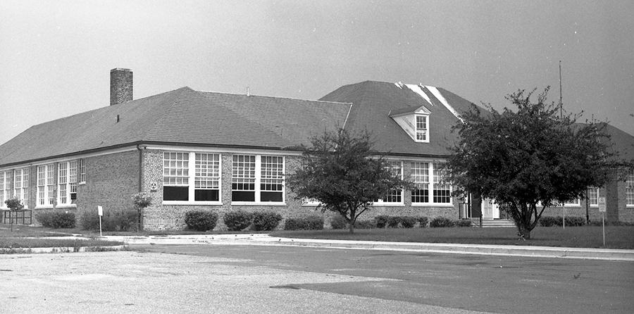 Black and white photograph of the front exterior of Lillian Carey Elementary School.