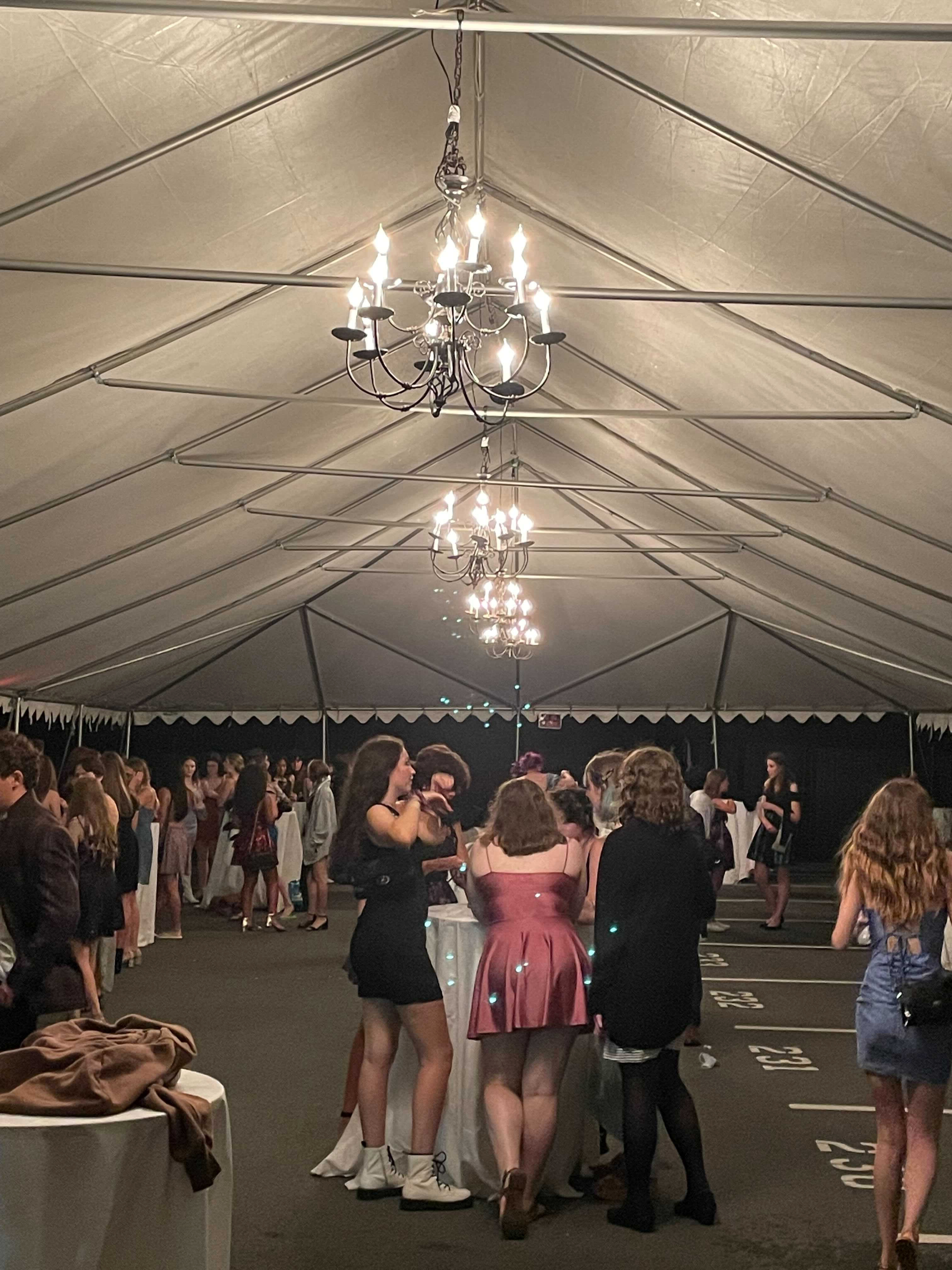 Students at James Madison High School in Vienna party in the parking lot, during the school's "Highway to Homecoming" dance. 