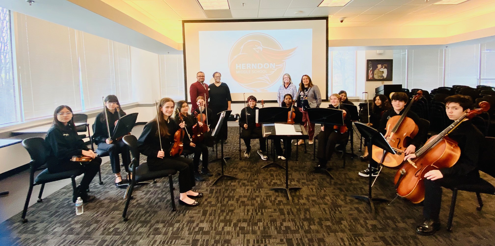 Members of the Herndon MS orchestra perform at Gatehouse