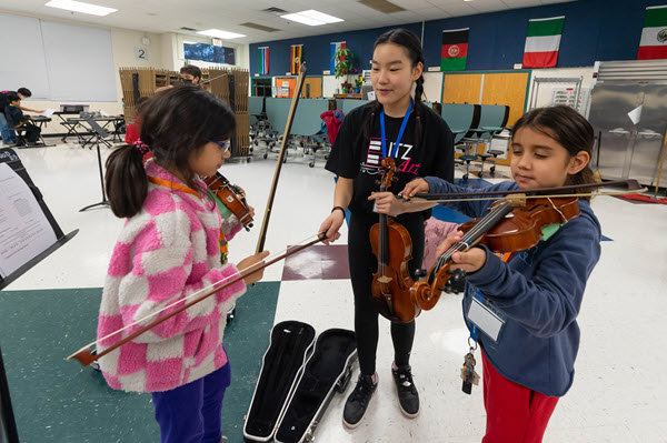music mentor helps elementary school students