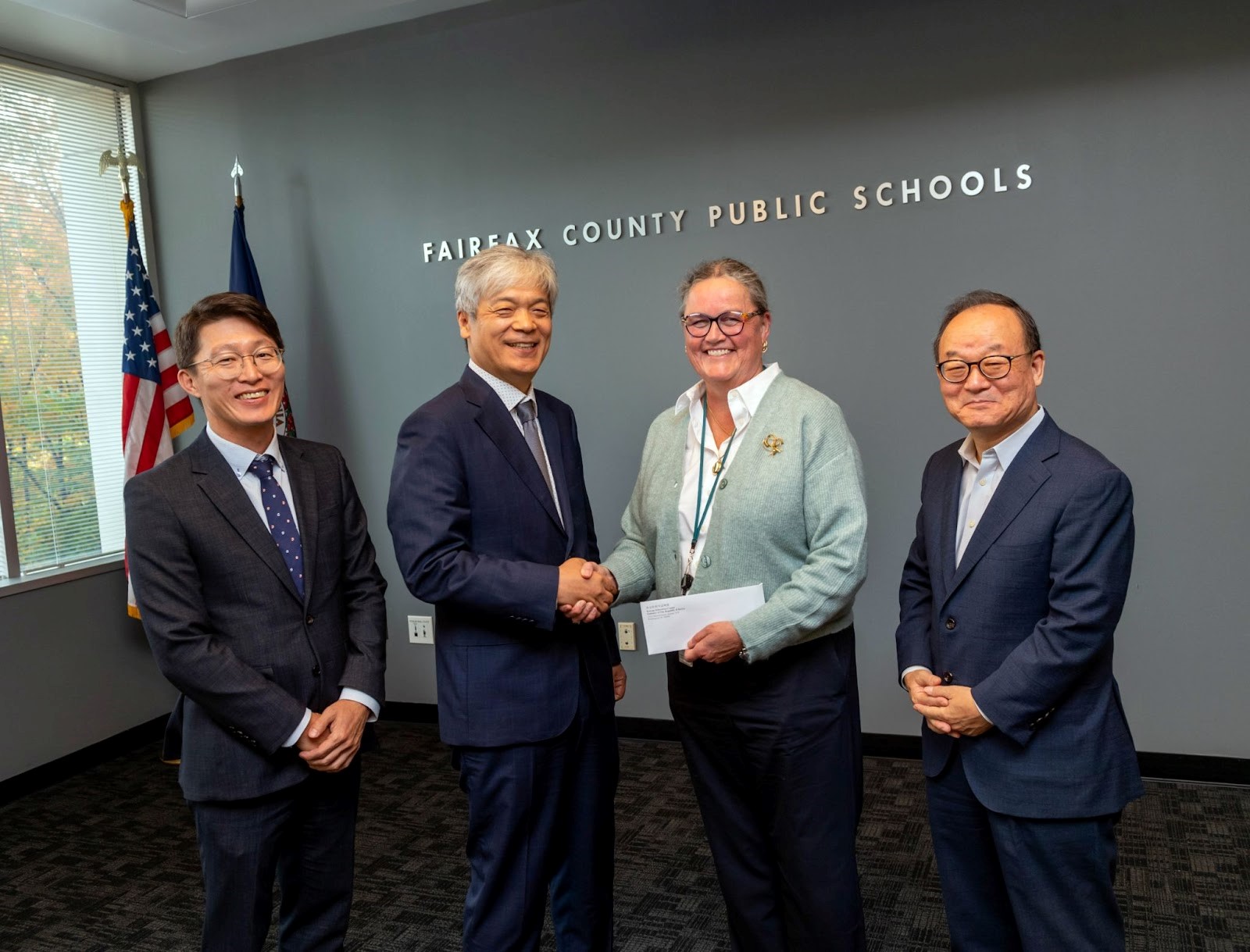 Dr. Reid accepts the Korean government’s financial support to enhance Korean language programs in FCPS