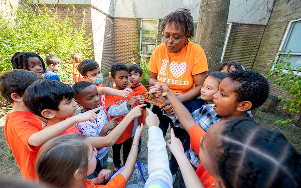 Students learn outdoors about butterflies