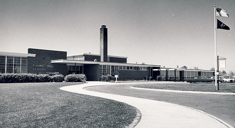 Black and white photograph of the main entrance of Pimmit Hills Elementary School taken in the late 1960s.