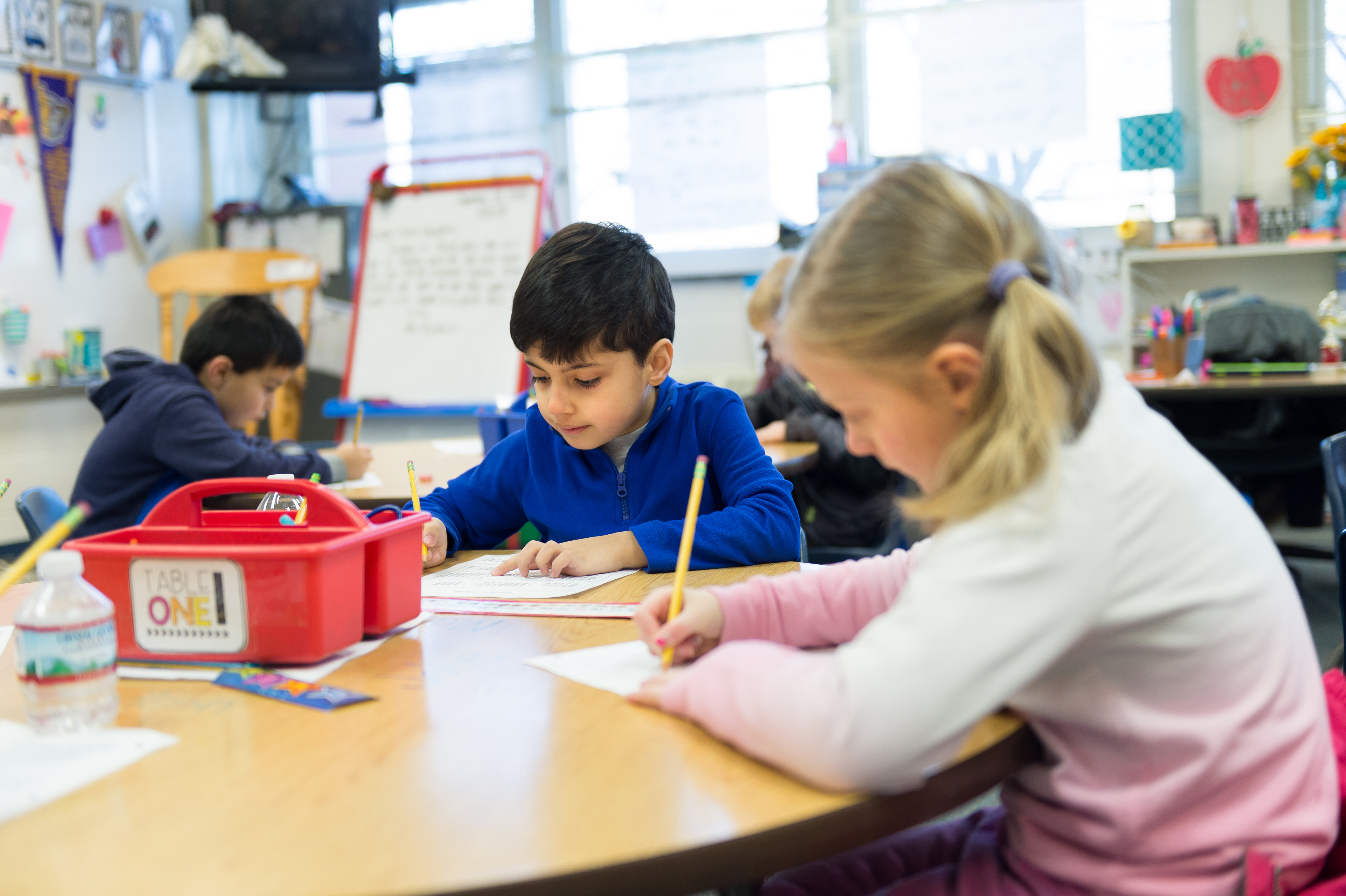 Students work together on an assignment in a classroom at Fairview Elementary.