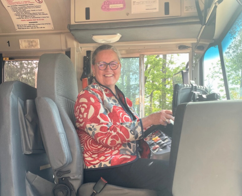 Dr. Reid in a school bus at the School Bus Road-eo event