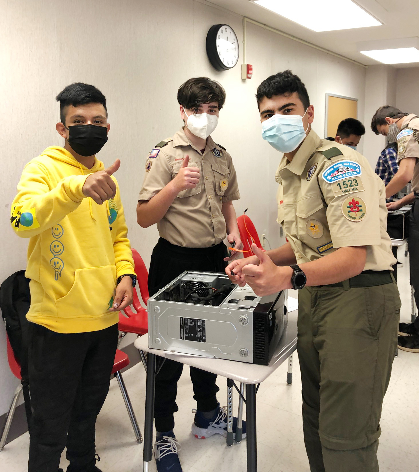 Frost Middle School students assisted Wallace in running the desktop building workshop.