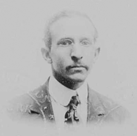 Black and white passport photograph of James E. Sadler.