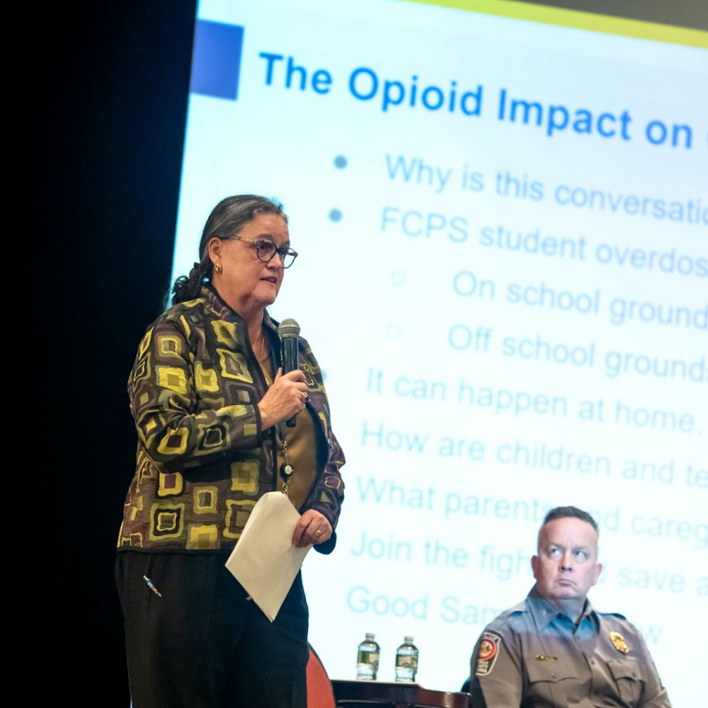 Dr. Reid speaking at a Community Conversation about opioids