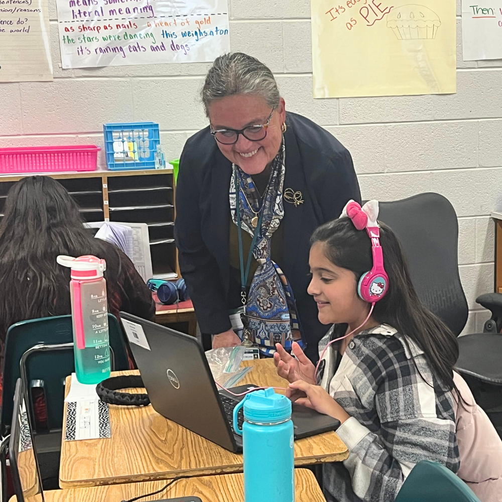 Dr. Reid with a fifth grade student at Halley ES
