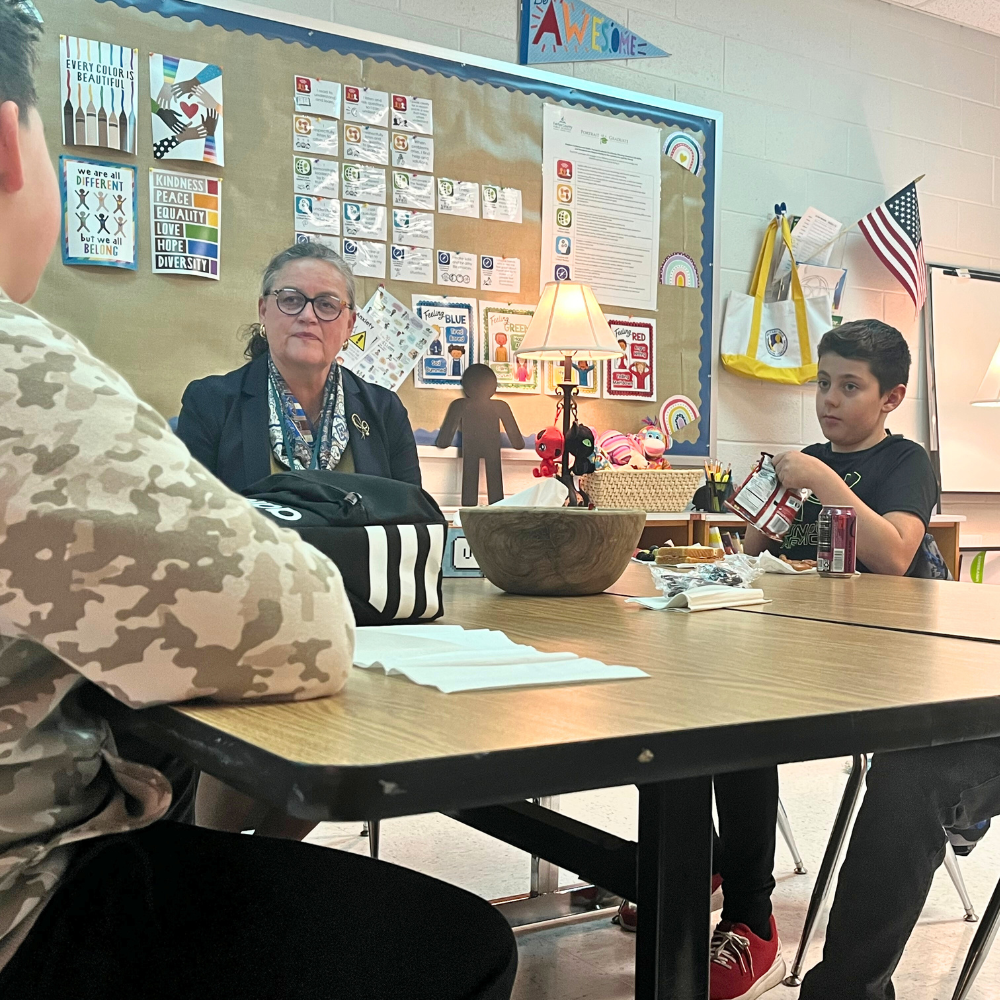 Dr. Reid with military-connected students at Halley ES