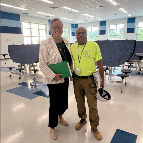 Dr. Reid meets with Dilip, the project manager for Louise Archer ES's renovations