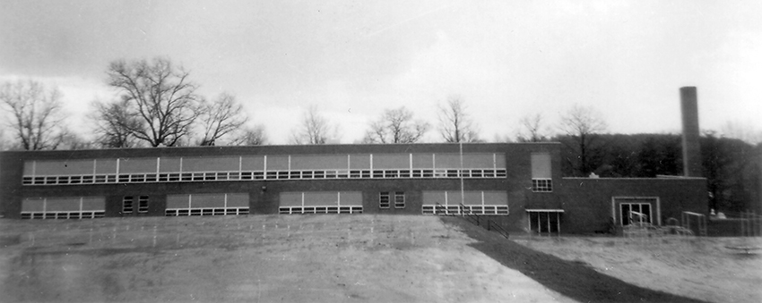 Black and white photograph of the front exterior of Willston Elementary School.