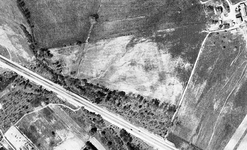 Black and white aerial photograph of the future site of Willston Elementary School.