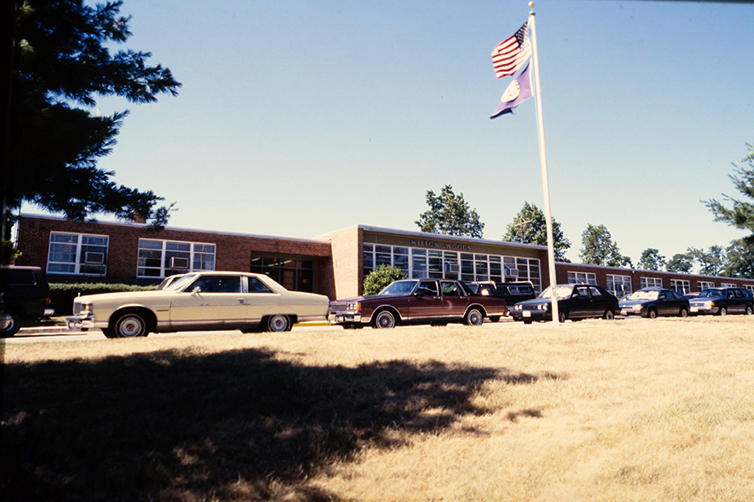 Undated color photograph of the front exterior of Wilton Woods Elementary School.