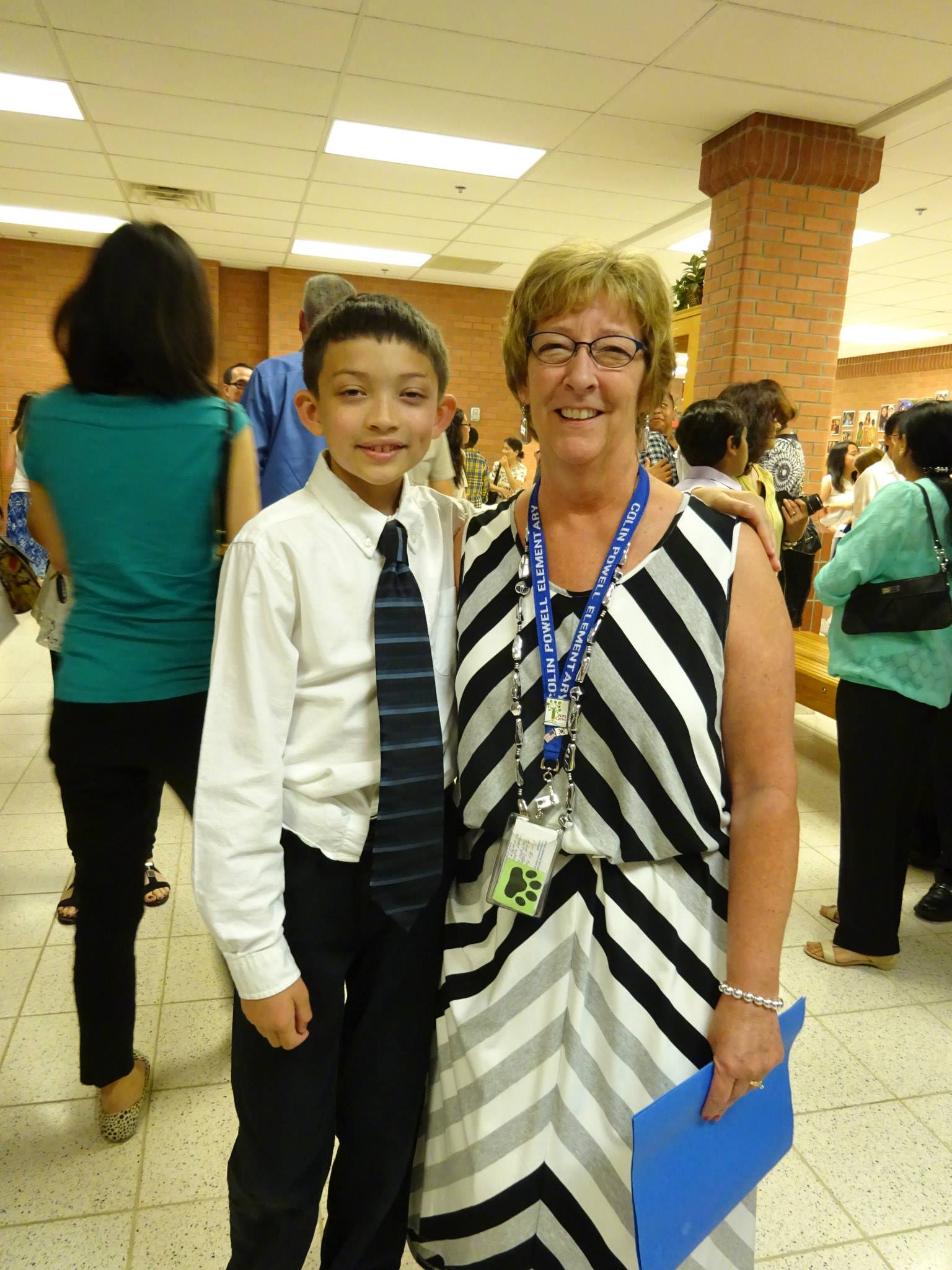 Logan with his teachers 