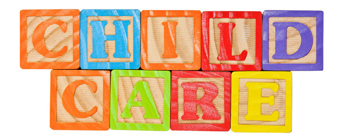 words child care spelled in children's blocks