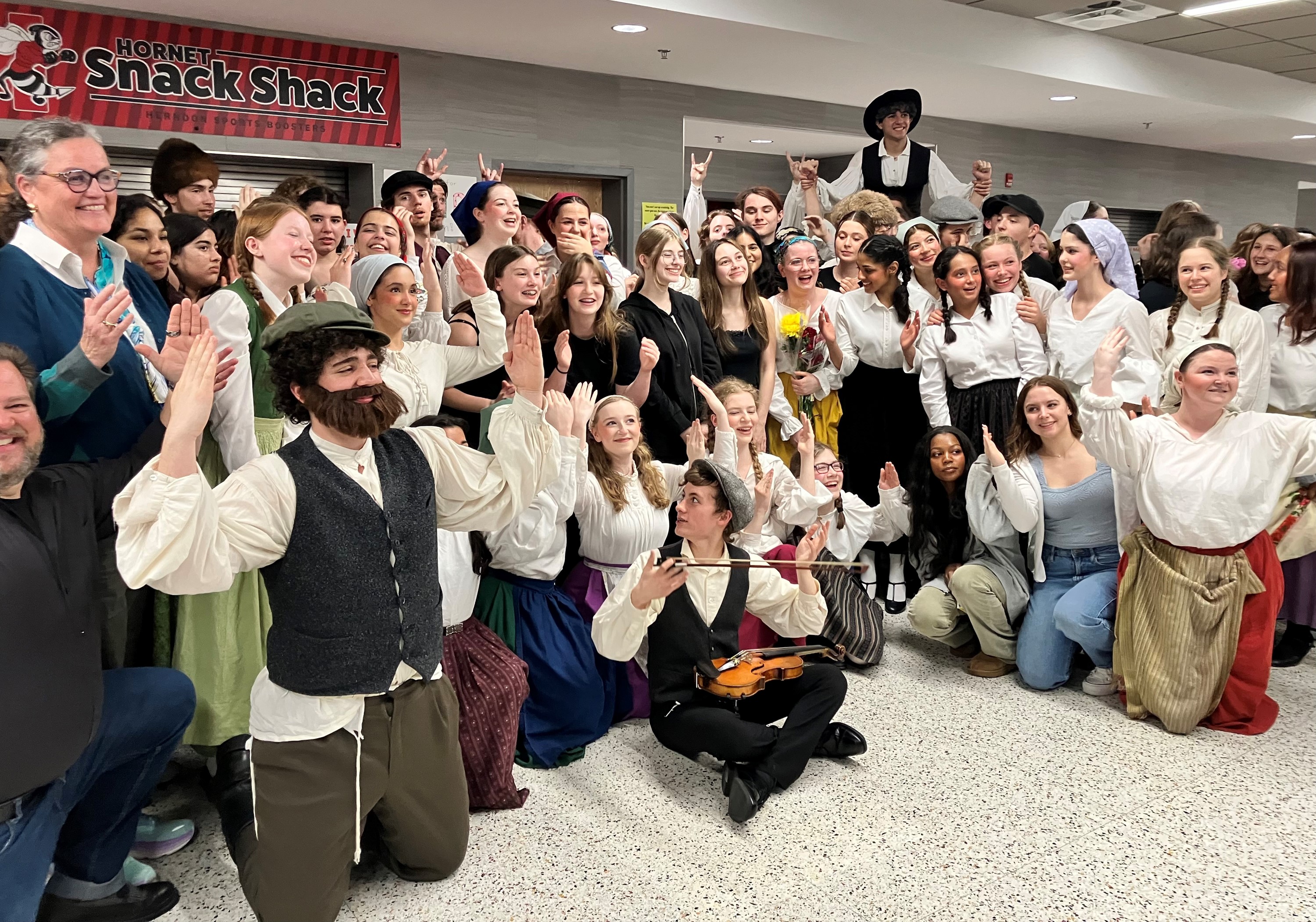 Dr. Reid with the cast of Herndon HS's production of “Fiddler on the Roof”
