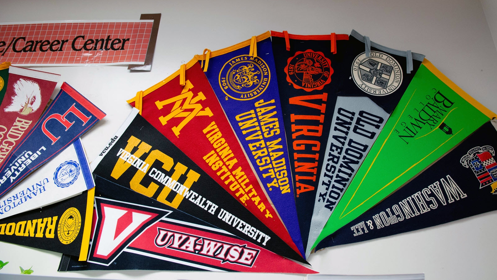 college banner hanging on wall